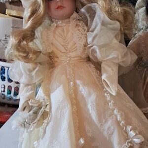 Elegant Cream Doll with Lace Dress